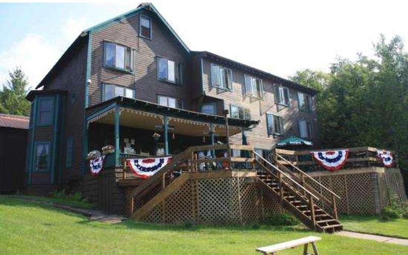 Big Moose Inn & Restaurant Restored Adirondack Wilderness Lodge in