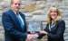 Sue Commanda accepts Corinth Merchant of the Year Award