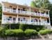 View of the motel with the two queen lake view rooms