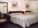 Standard two queen room, lake view from the attached common porch