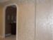 Shimmering metallic striae walls with embossed stencil pattern on top