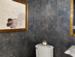 Paint, metallics, stain and stencil work make an elegant wall finish