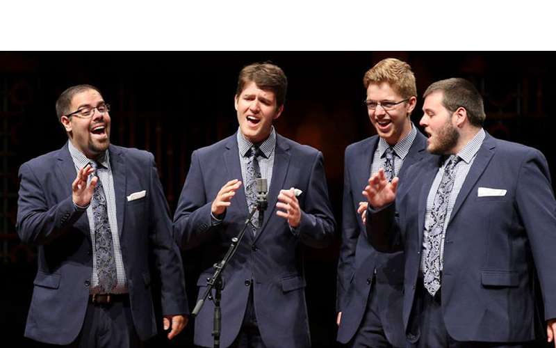 Photo Credit: Lorin May/Harmonizer: Photo from the International Youth Barbershop Quartet Contest, courtesy of Barbershop Harmony Society – Northeastern District (NED) four barbershop singers