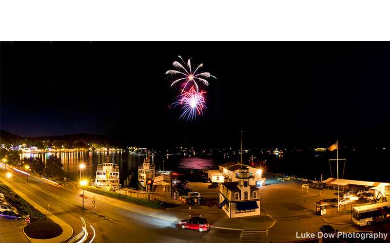 fireworks going off over lake george