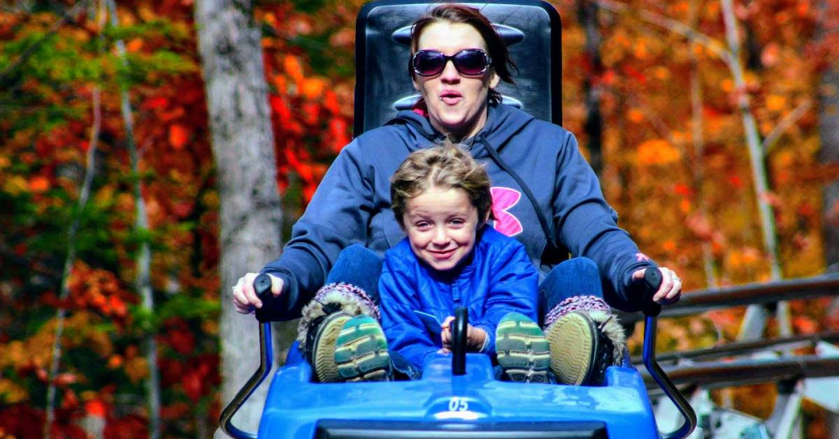 parent and kid on coaster