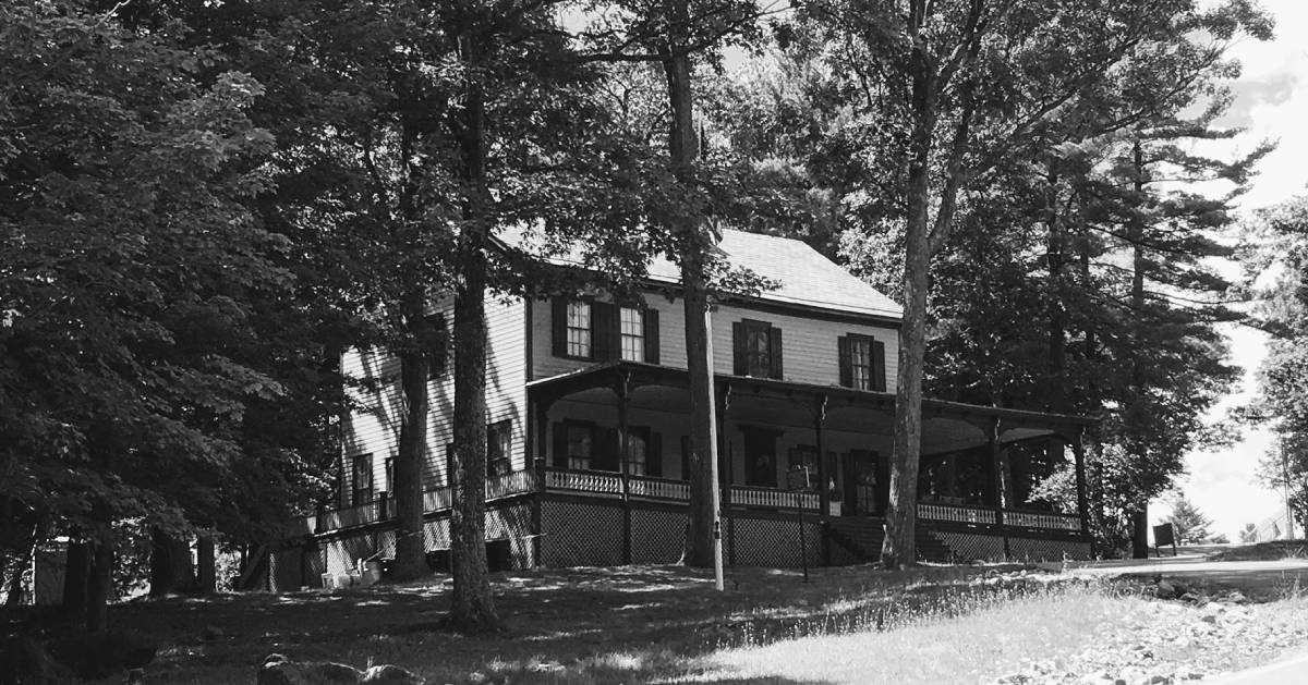 black and white photo of cottage