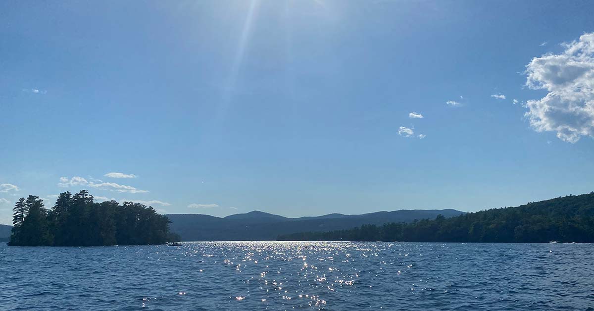 kayaks on lake barely visible