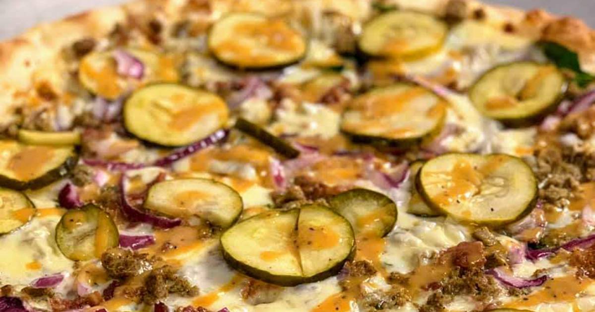 pizza with pickles on it