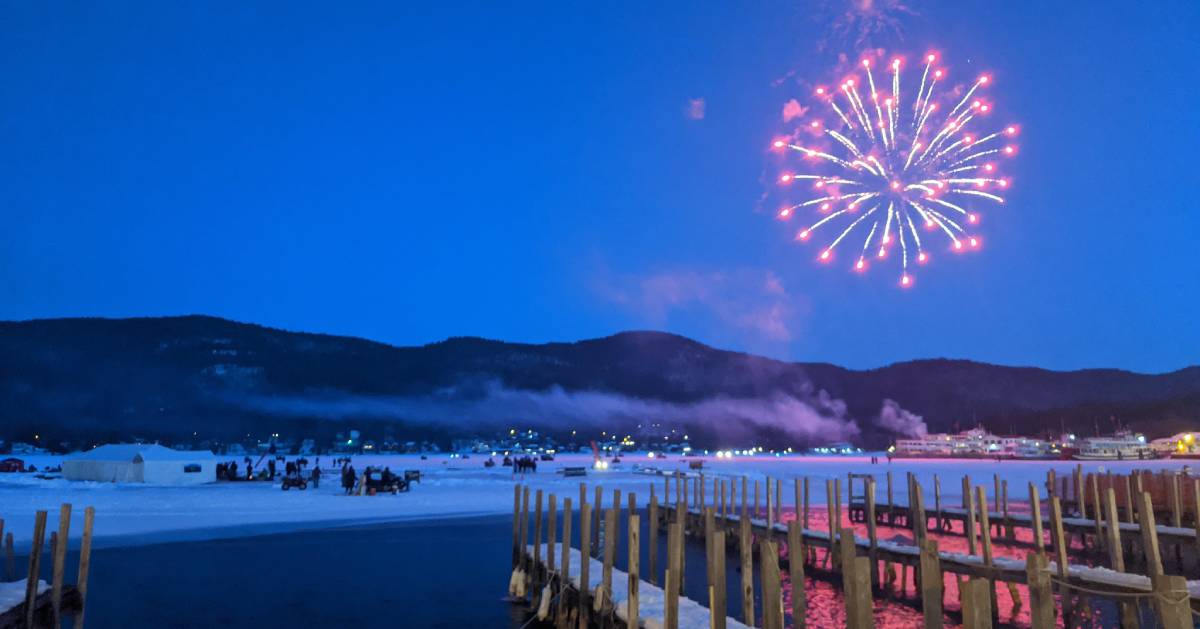 fireworks over lake in winter
