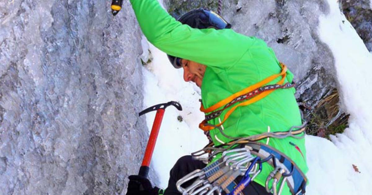 a man climbing ice