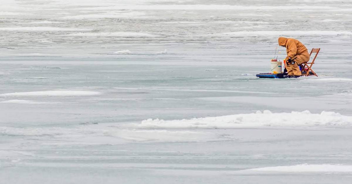an ice fisherman on the ice