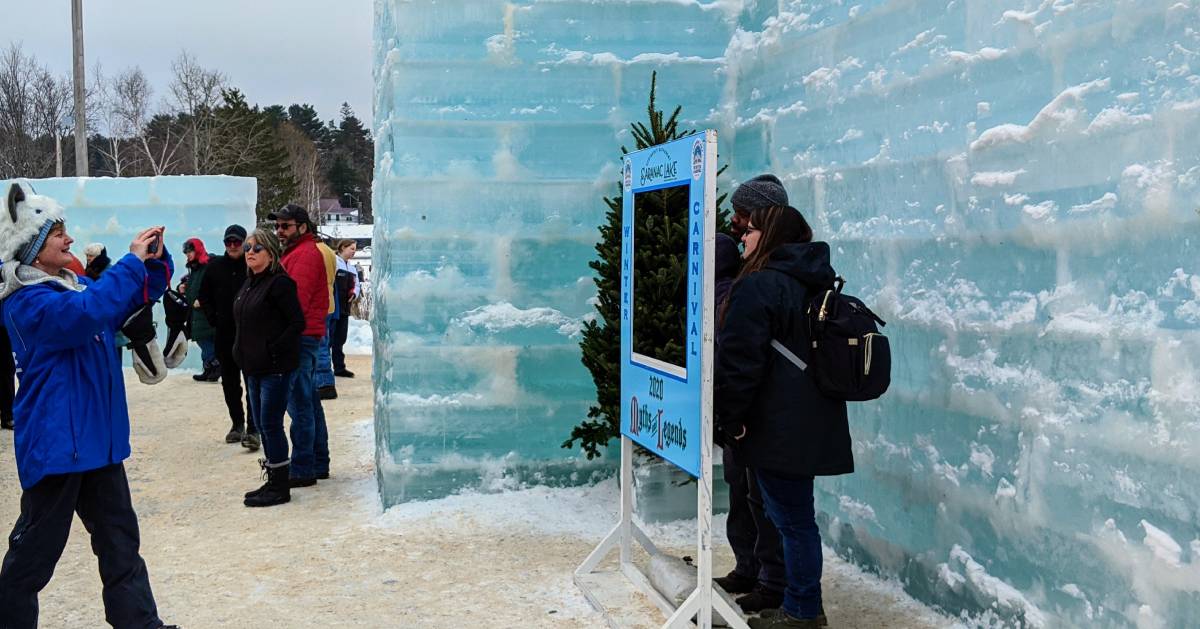 couple taking a photo together at the ice palace