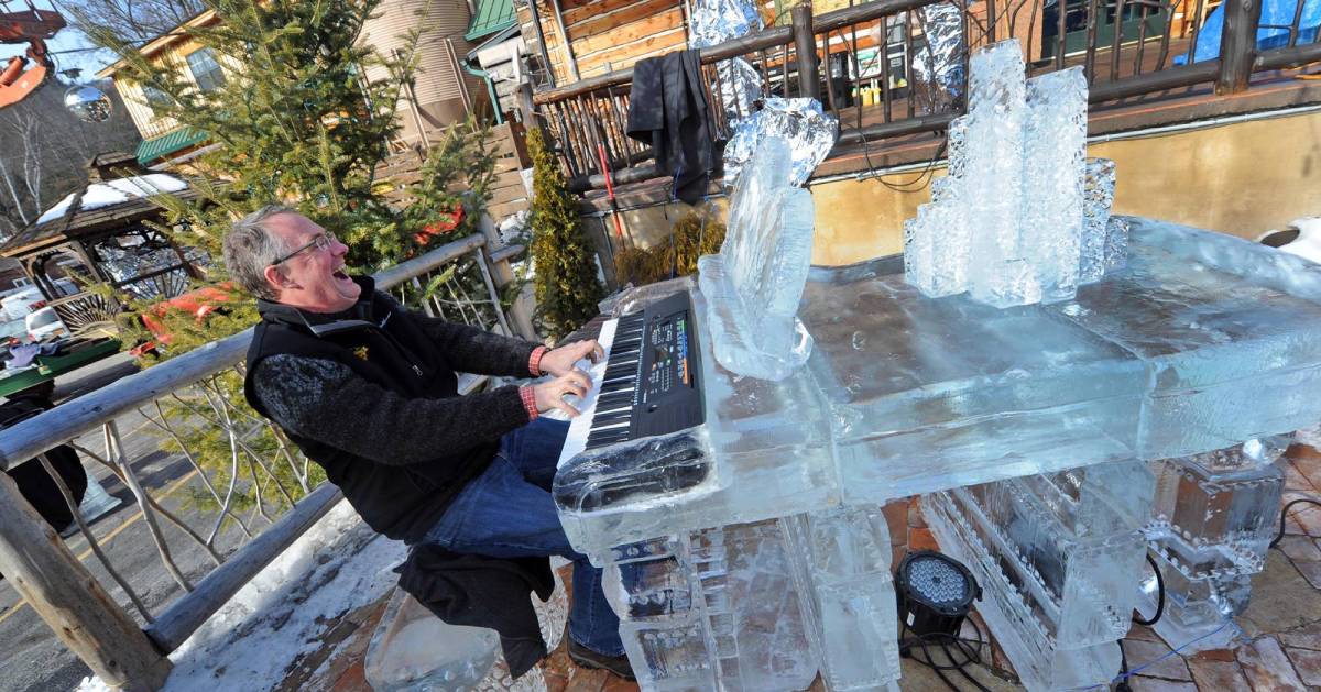man playing ice bar keyboard