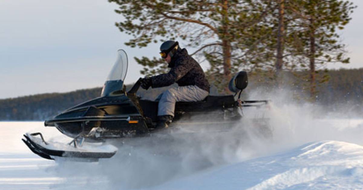 snowmobiler moving fast