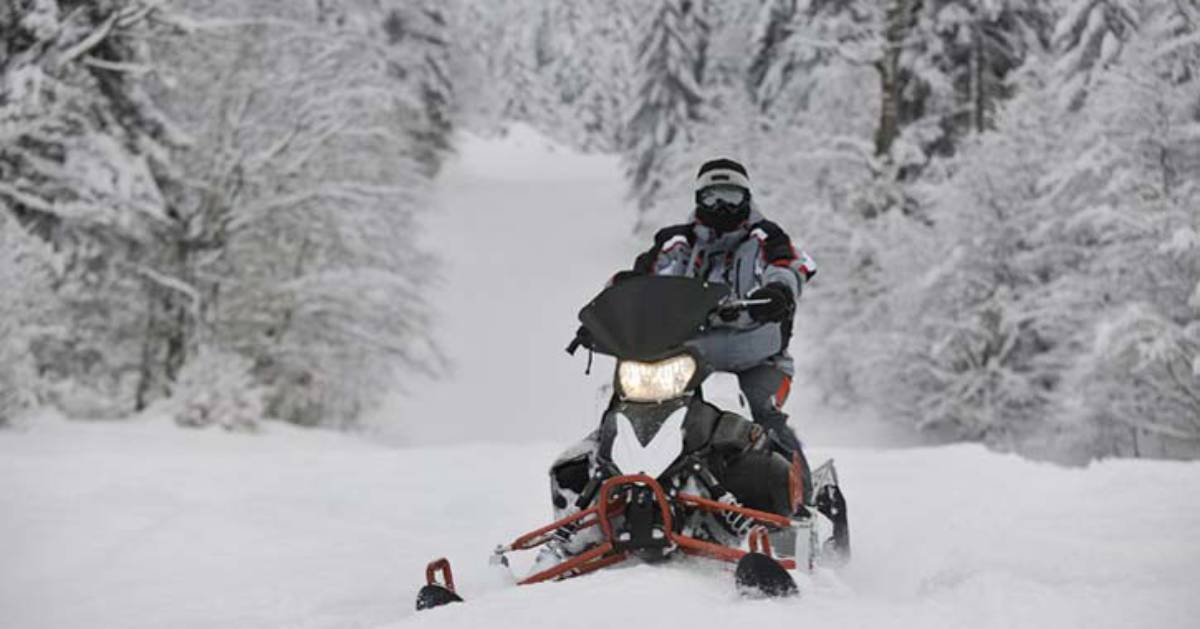 snowmobiler on route