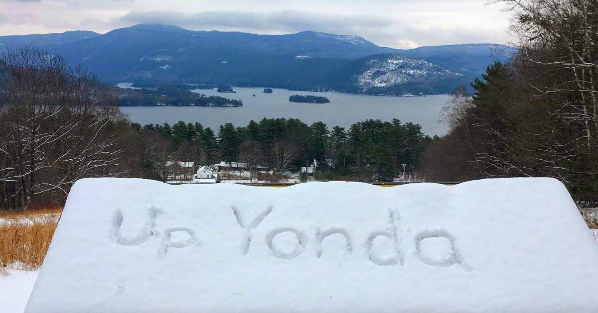 sign covered in snow, Up Yonda written in snow, nice view