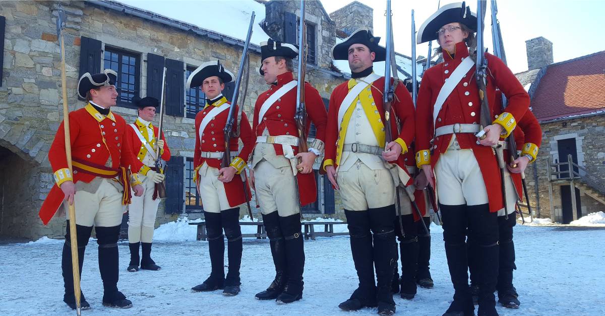 group of reenactors in red solider outfits