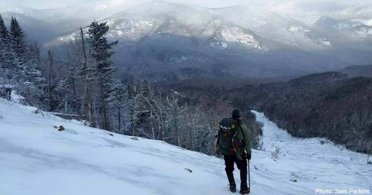 hiker in winter on mountain