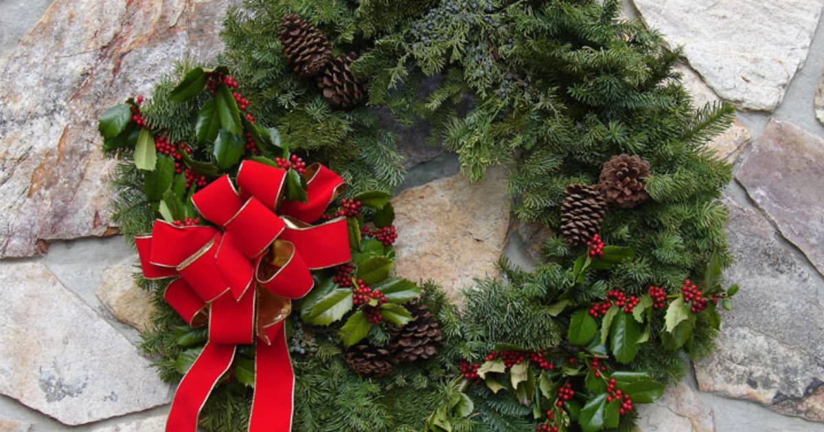 holiday wreath with red ribbon