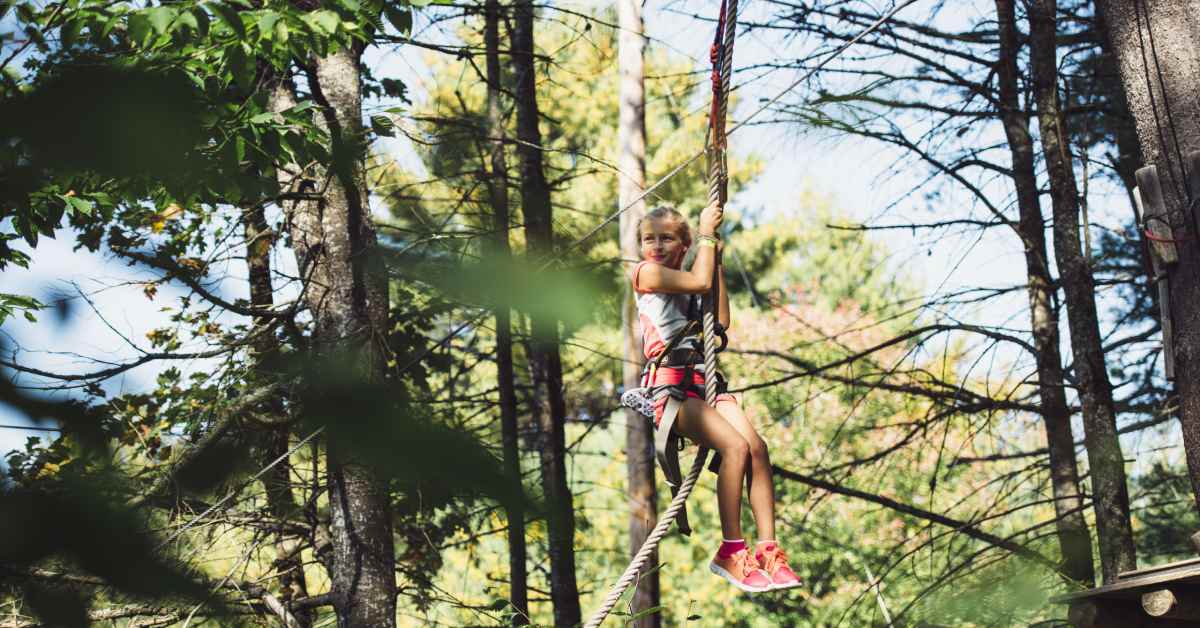 girl in treetop course