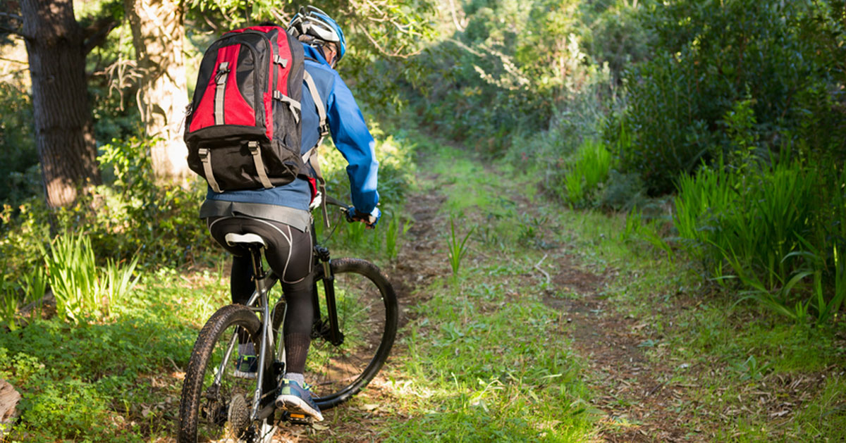 close up of mountain biker biking