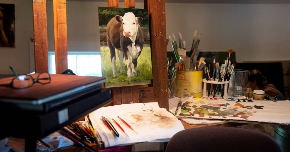 cow painting in studio