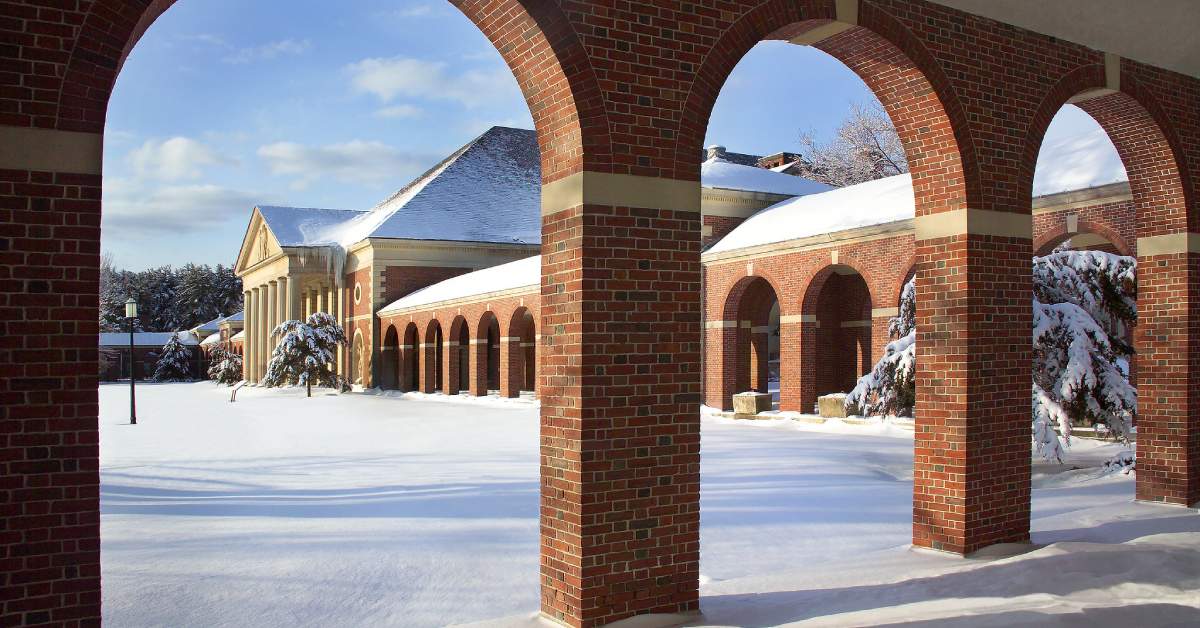 brick building and snow on the ground