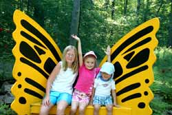 Kids Sitting in the Butterfly Chair in Bolton Landing