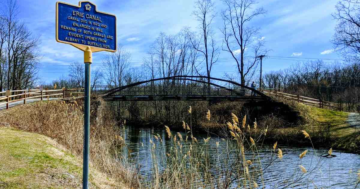 erie canal sign and a bridge