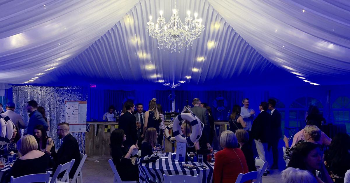 guests at a nautical-themed gala in saratoga springs