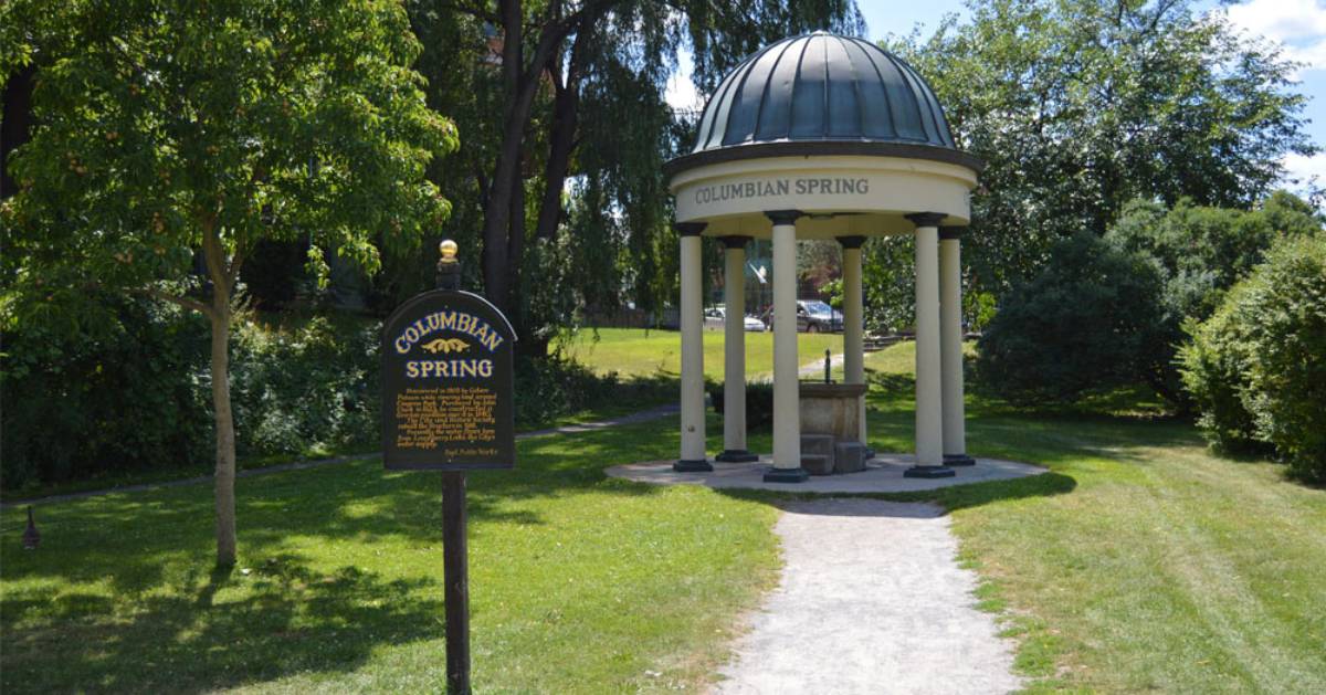 sign and fountain for the columbian spring