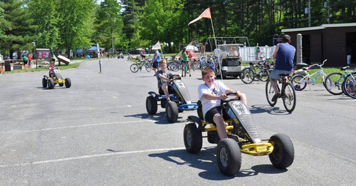 kids riding on pedal karts