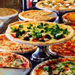 pizzas on display