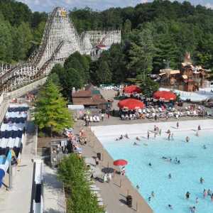 aerial view of roller coaster and pool