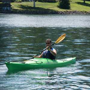 guy paddling on waterway