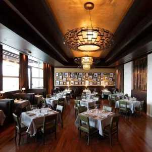 a dining room with tables set