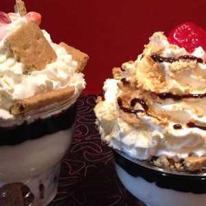 two dishes filled with ice cream sundaes