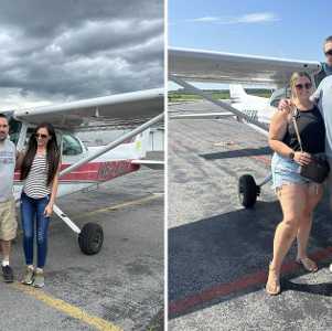 people posing by a small plane