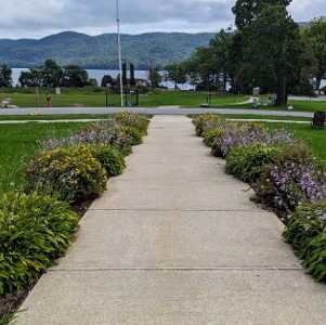 silvery bay ymca property with walkway and view of lake and mountains