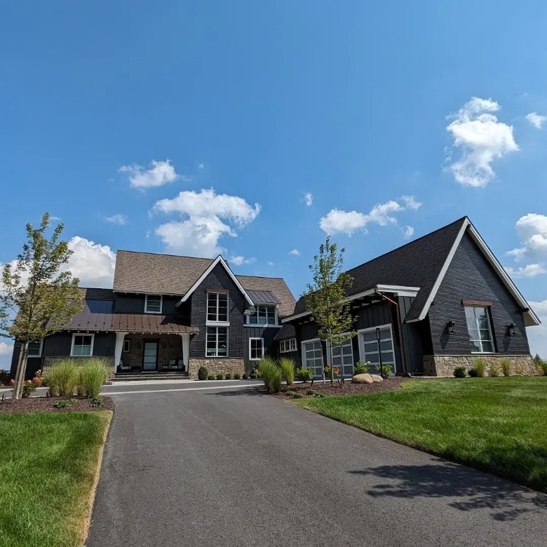 large driveway leading up to a house