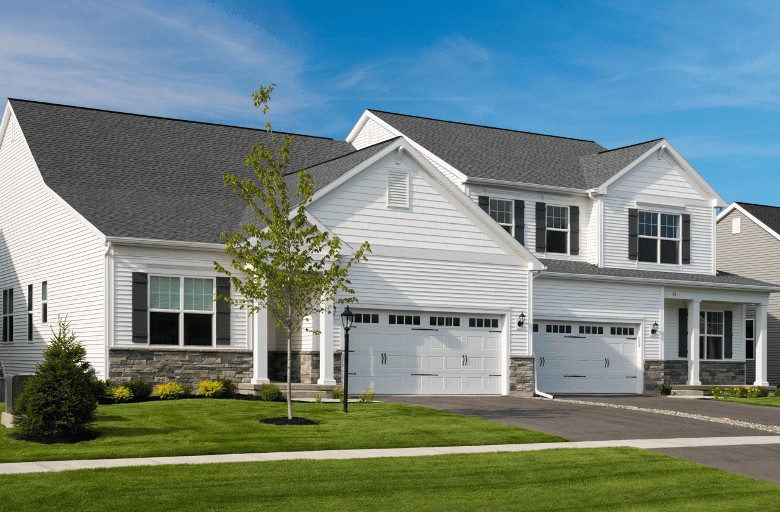 large white house with two garages
