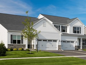 large white house with two garages