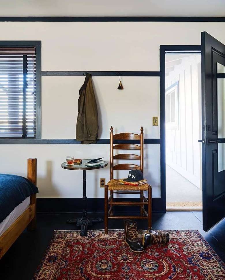 hotel room with chair and shoes