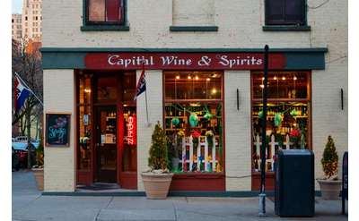 wine store with window decorated for St. Patrick's day