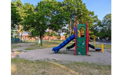 playground with slide and climbing wall