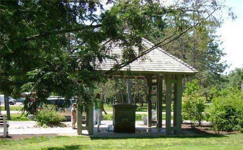 covered pavilion protecting geyser spring