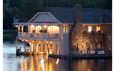 a view of the inn from across the water at night