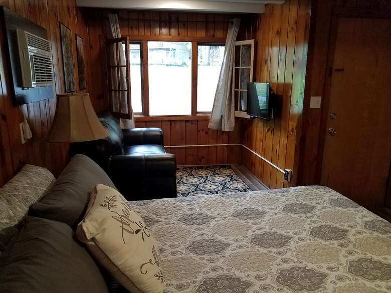 Duplex Cottage #12 now features a King size bed and seating area.