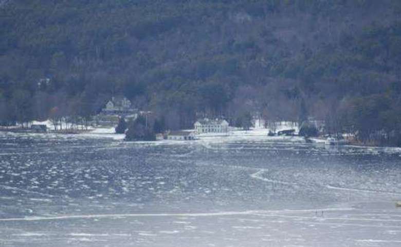 view of lake george from shelving rock in winter