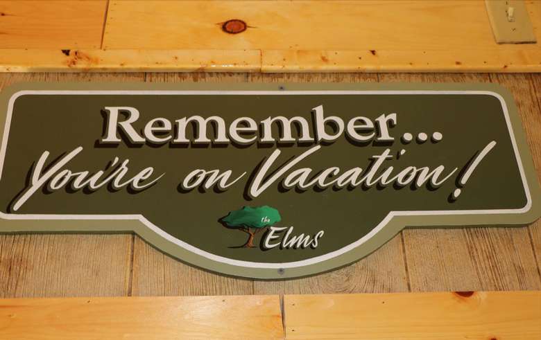 sign that says Remember...You're on Vacation!